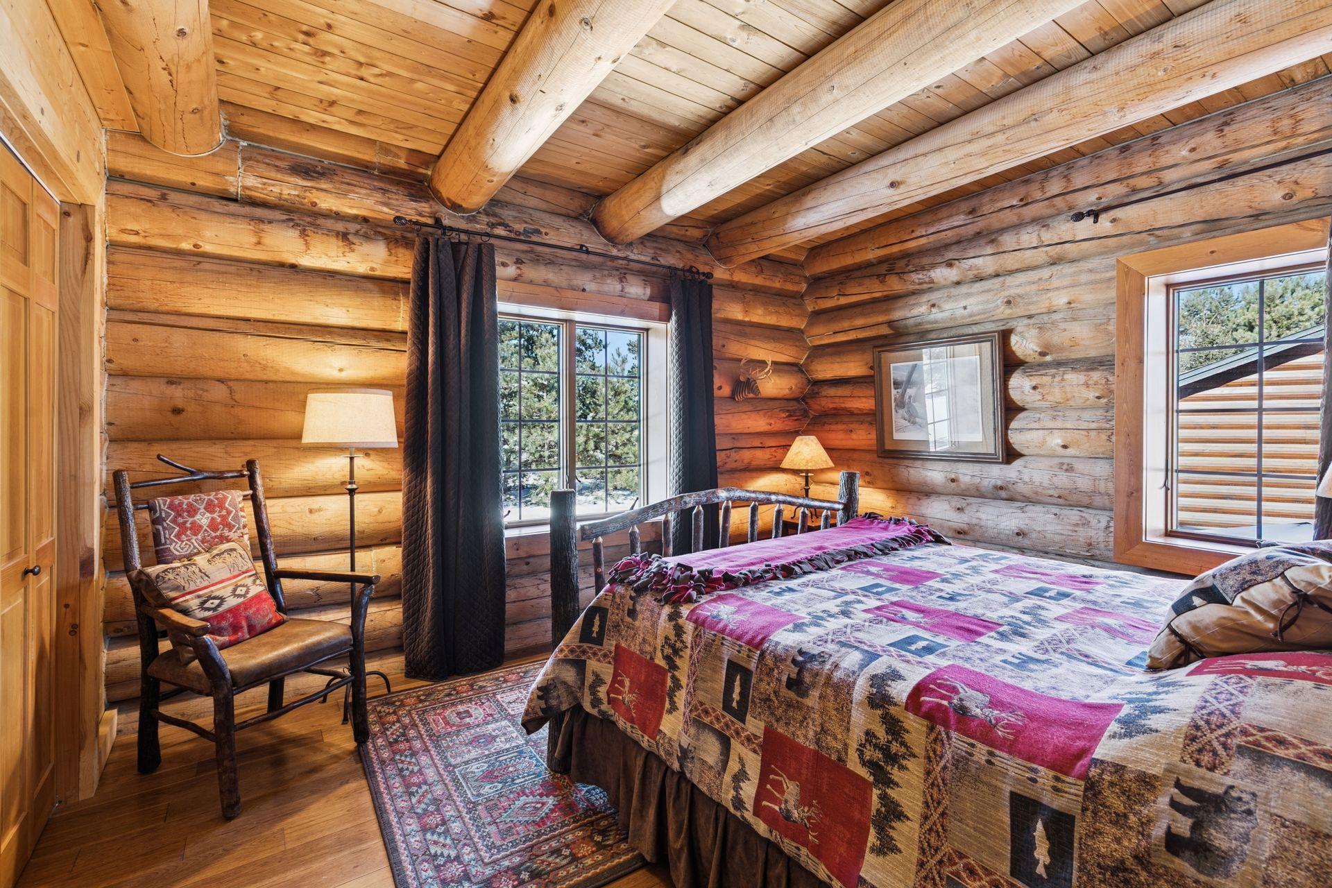 Main level bedroom the home offers Anderson windows throughout the property