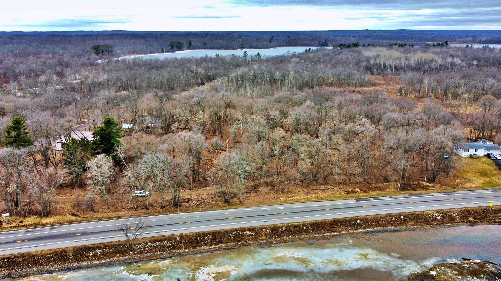 Areial View of All 3 Tracts and Mille Lacs Lake in foreground.jpg