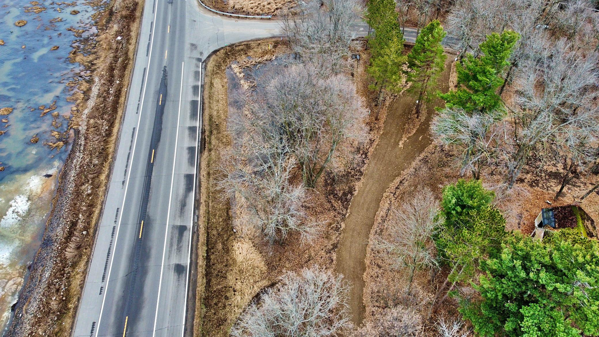 Aerial View over access road and along Hwy 169.jpg