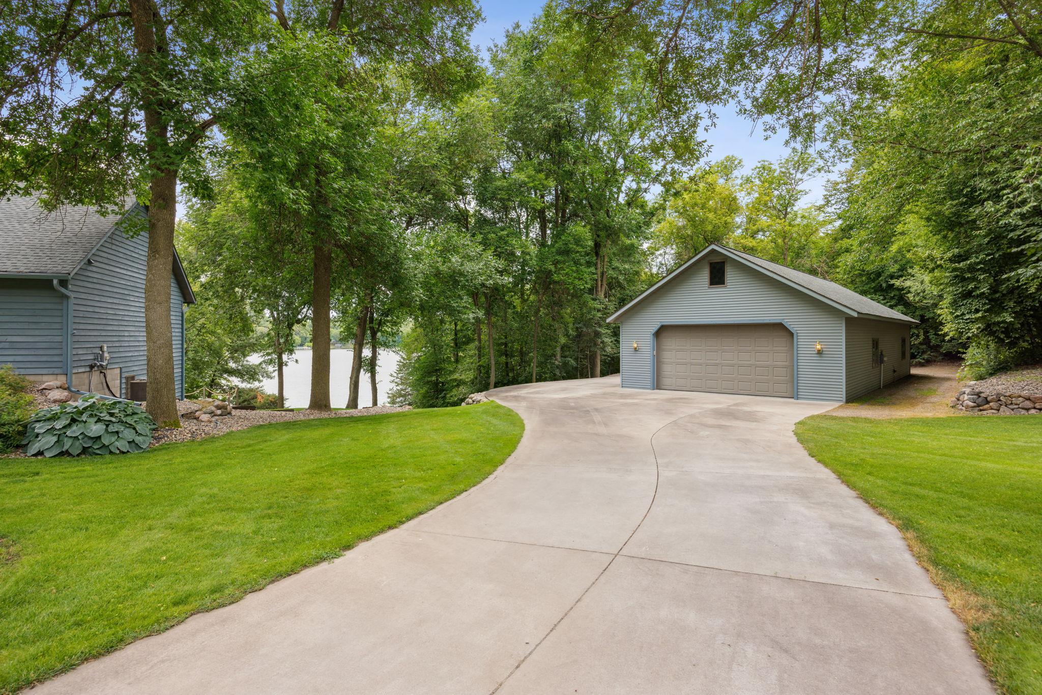 This property is the total package with privacy, lakeshore and a large outbuilding. Lake Marie at 145 acres with great fishing and is connected to 192-acre Lake Louisa through a channel giving you 337+ acres to explore and enjoy!