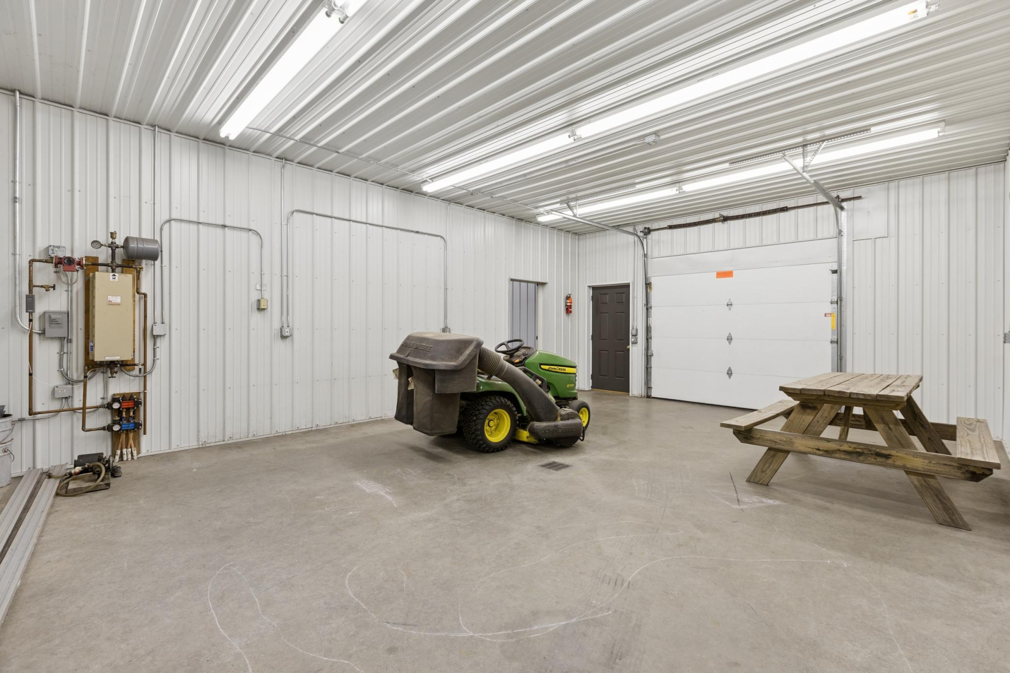 Rear section of the pole shed is 28x20 with in-floor heat. Perfect for a workshop area while using the rest of the shed for storage!