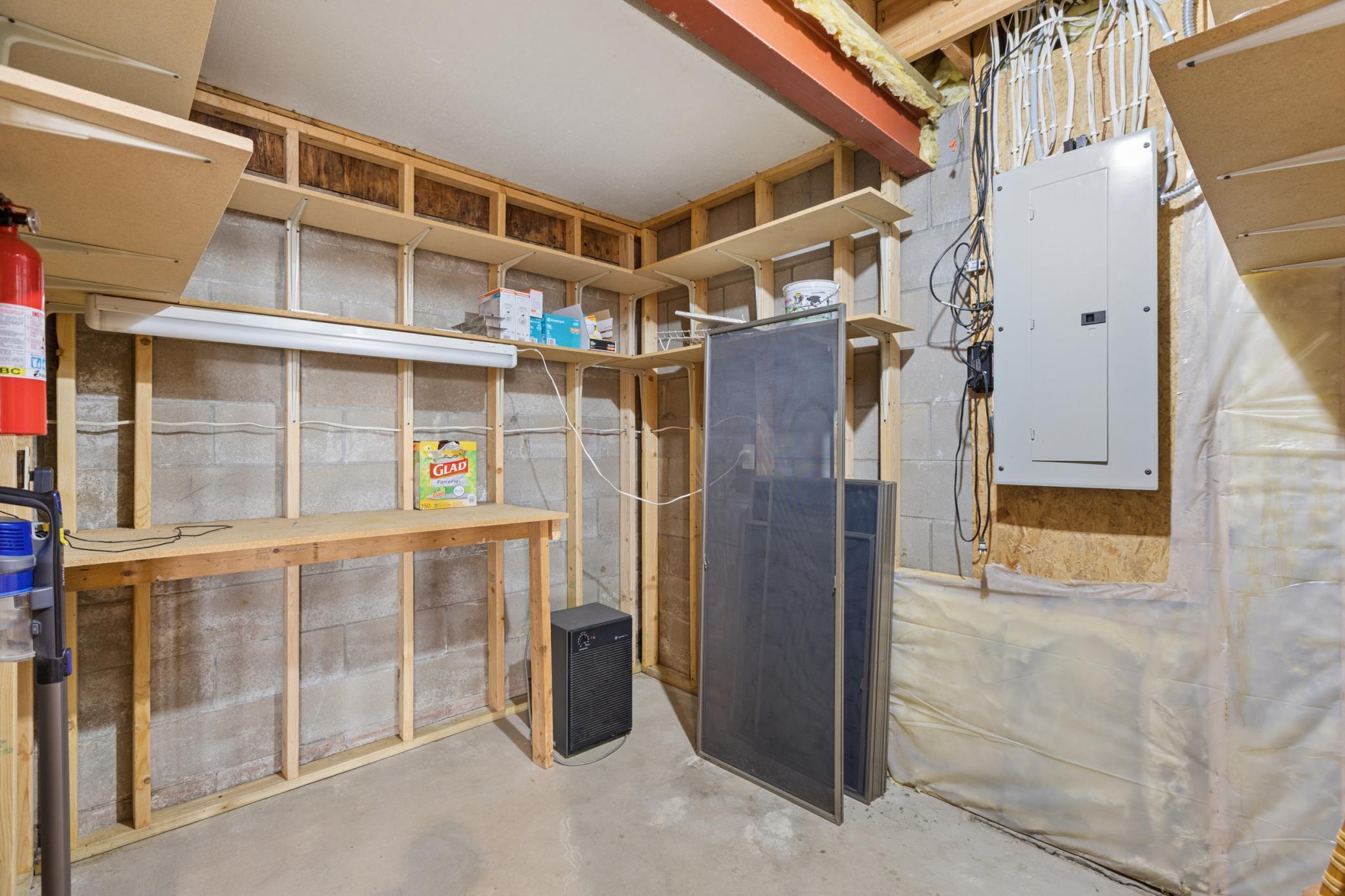 Just off the kitchen is a large storage room or storm shelter. Perfect for off-season storage and additional pantry space.