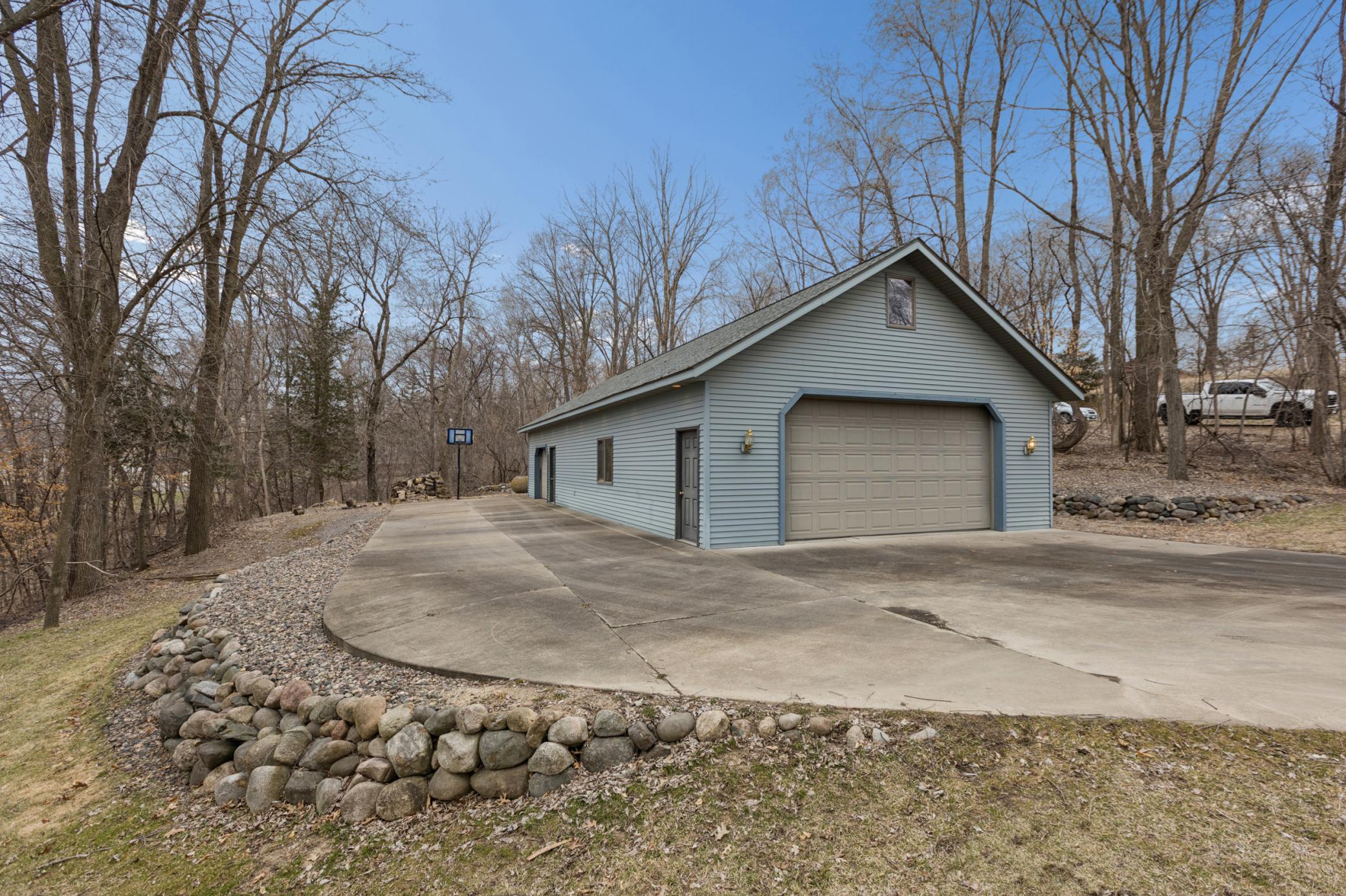 With the concrete driveway wrapping around the pole shed a building like this is tough to beat! Overhead doors measure 9x18 & 9x7 with room for all the toys!