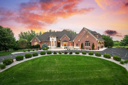 Built by esteemed luxury builder Steiner & Koppelman, this former model home features a full brick exterior that is both maintenance-free and architecturally timeless.