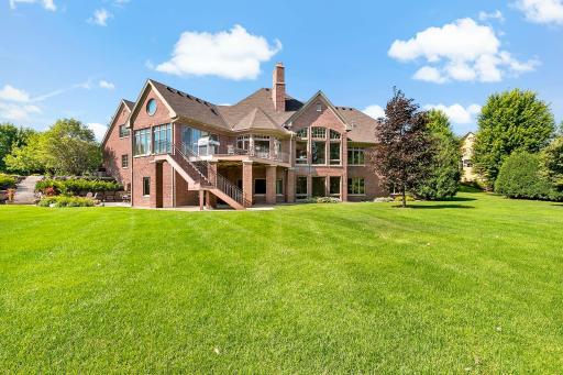 Surrounded by other executive-level homes in the prestigious Wild Meadows North community, this property stands out with its stately presence and unmatched attention to architectural detail.