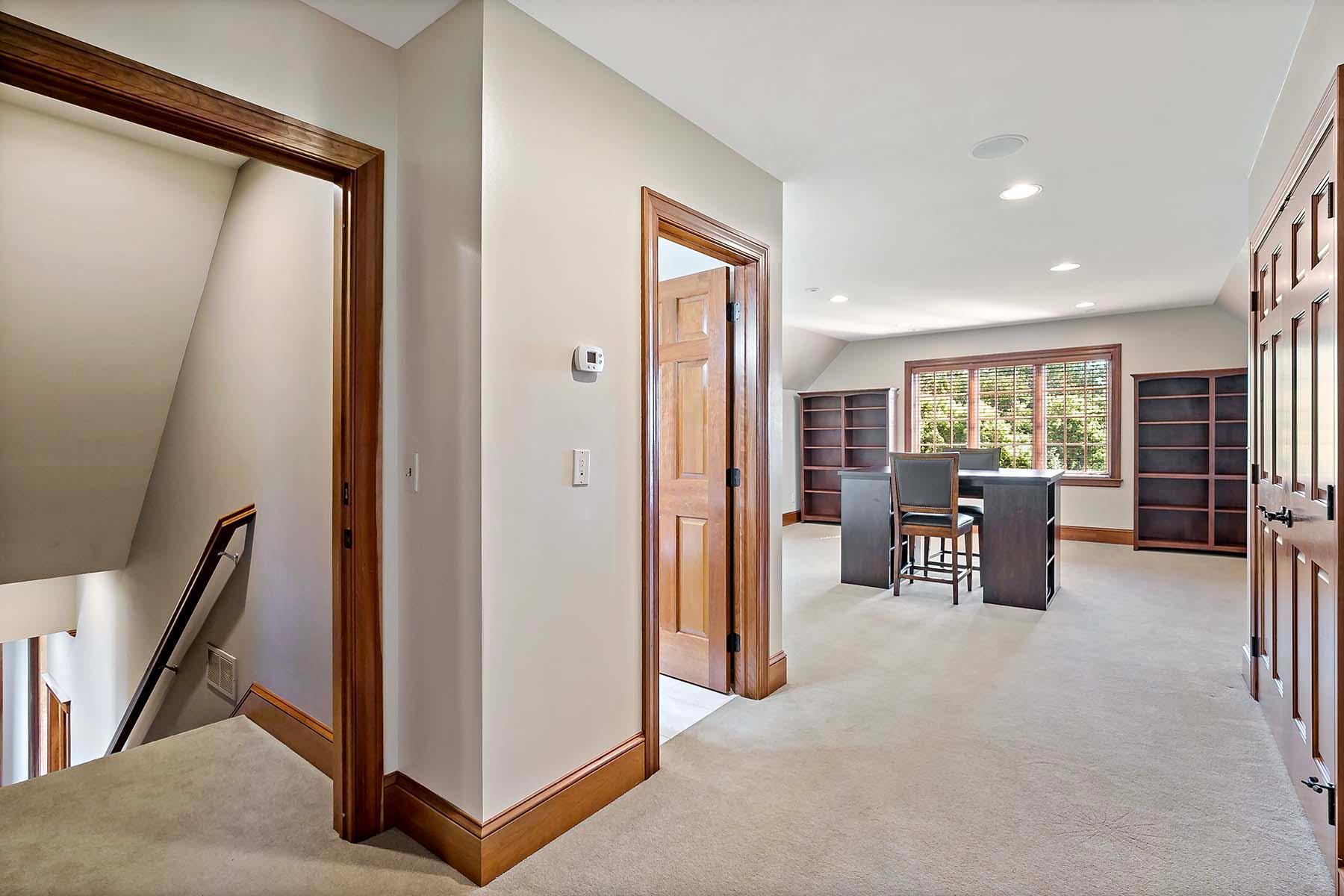 Bonus private living space above the garage, plumbed for a kitchen by the builder