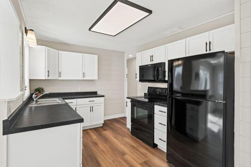 The kitchen is so bright and spotless