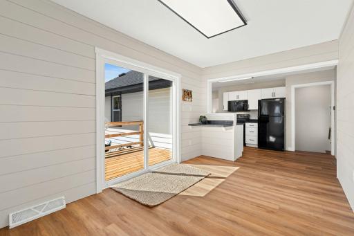 Step out onto the new deck with wonderful access to the backyard