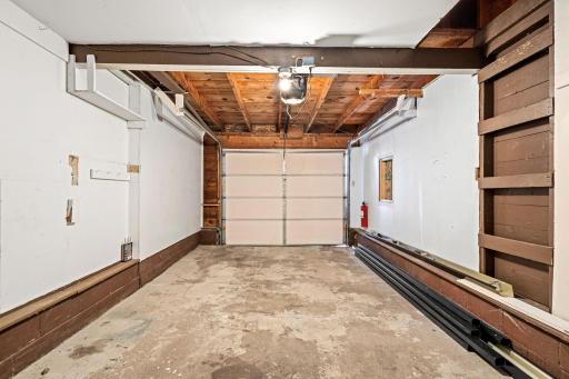 Extra deep 1 Car Garage with added parking outside