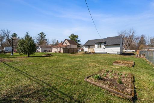 You also have a peek of Lake Mora from your backyard