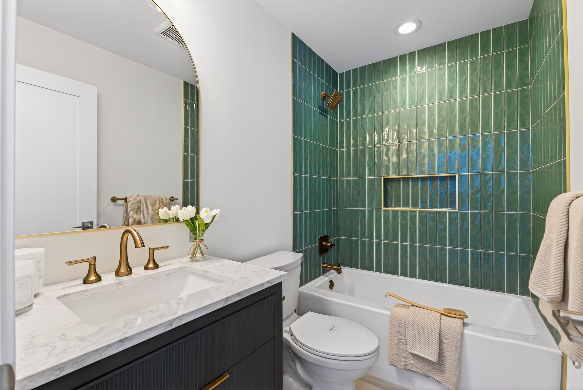 Bedroom 2—Secondary Suite with a private bathroom and walk-in closet