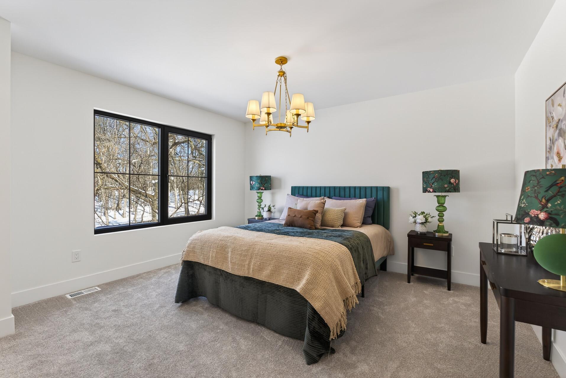 Bedroom 2—Secondary Suite with a private bathroom and walk-in closet