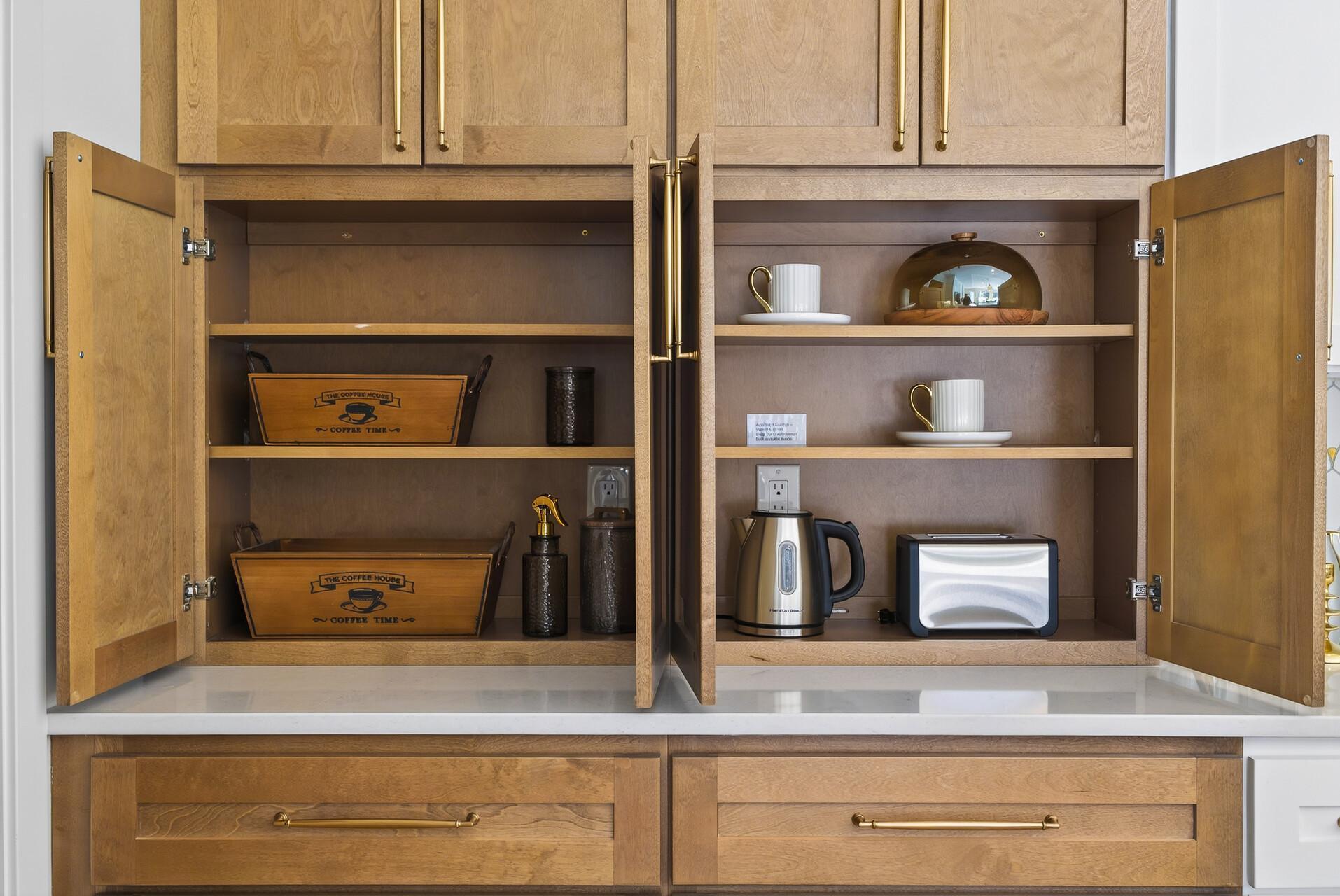 Appliance garage with outlets inside the cabinetry—perfect for keeping small appliances neatly out of sight