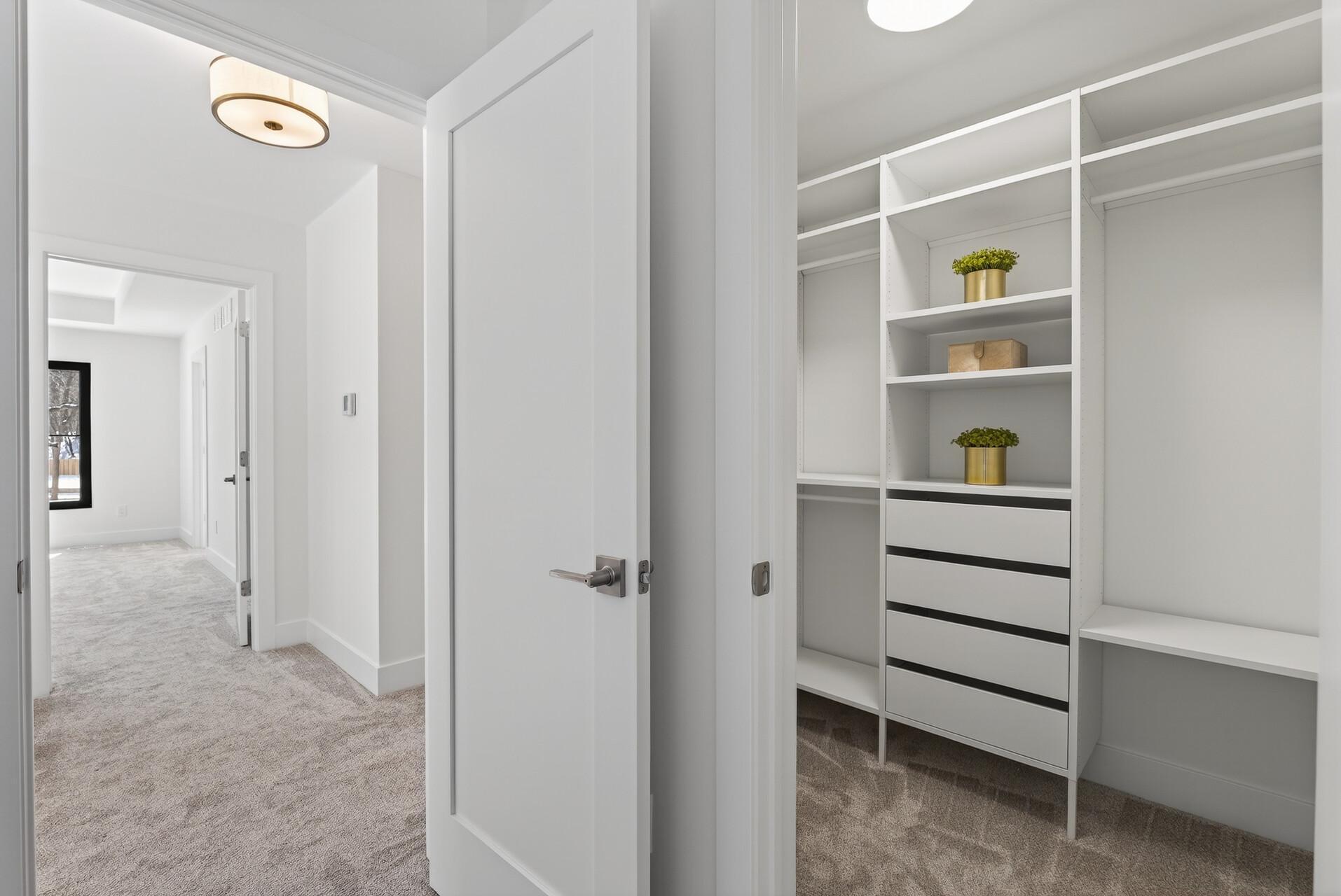 Bedroom 2—Secondary Suite with a private bathroom and walk-in closet