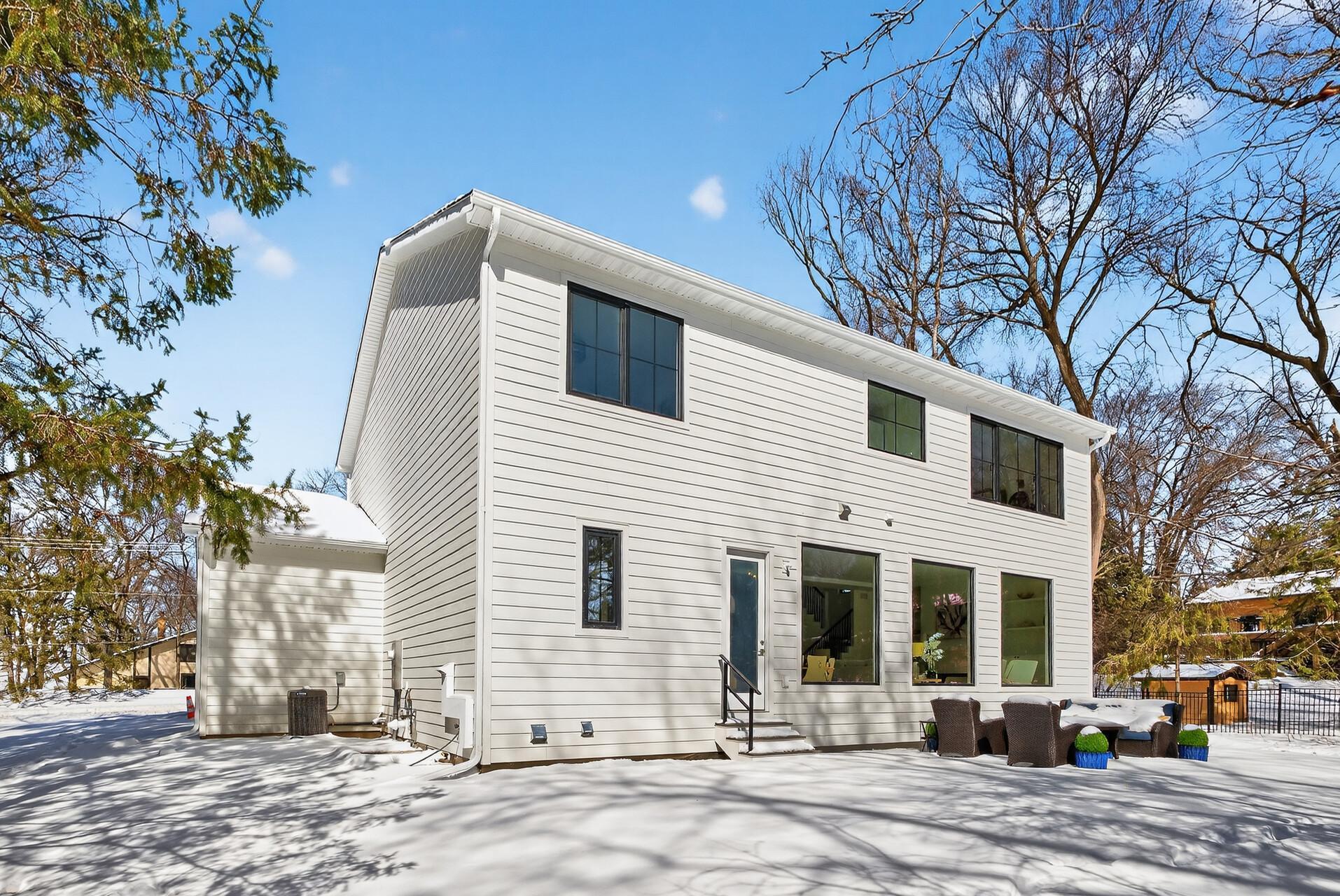 Beautiful, rare, flat half-acre lot with mature trees