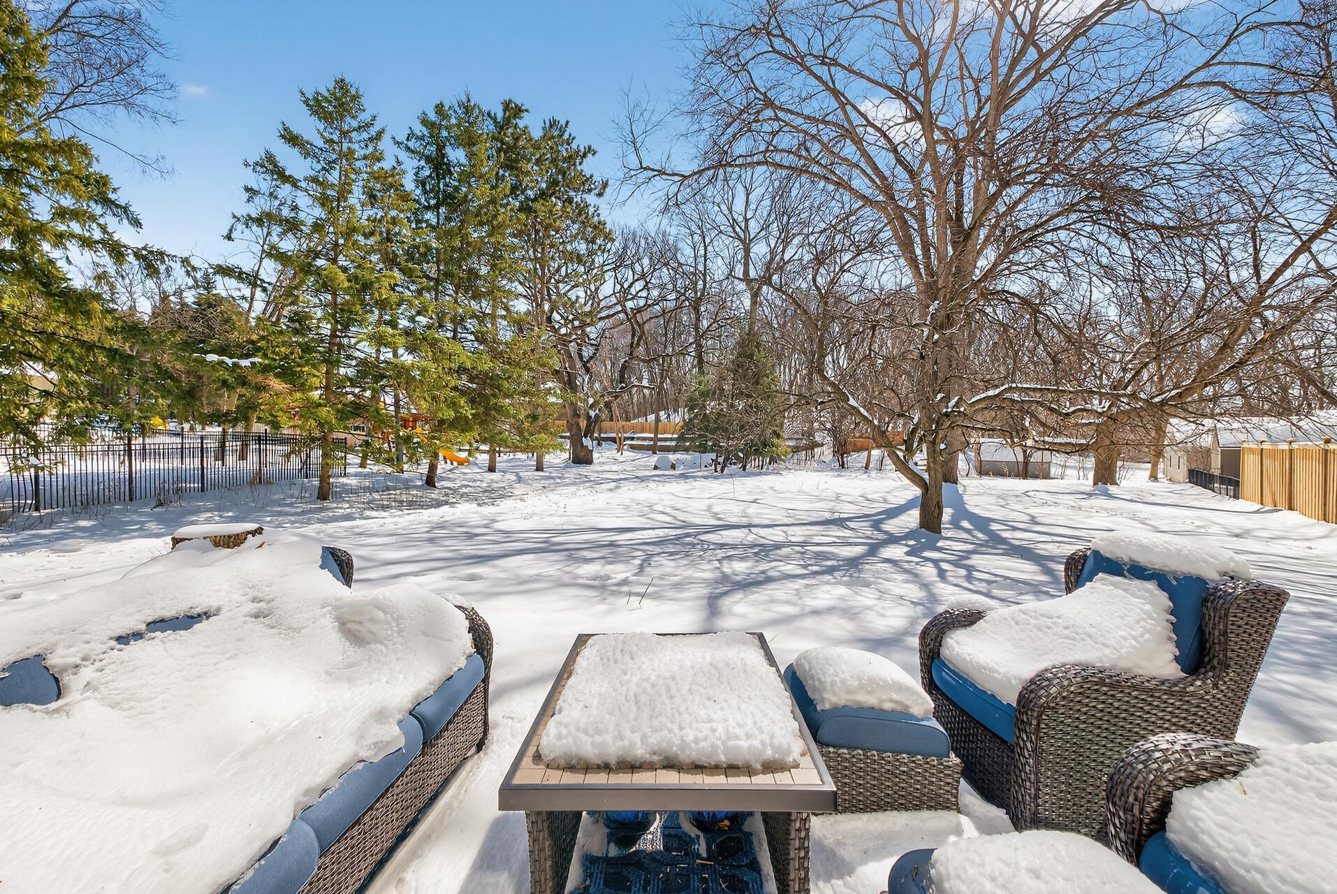 Beautiful, rare, flat half-acre lot with mature trees