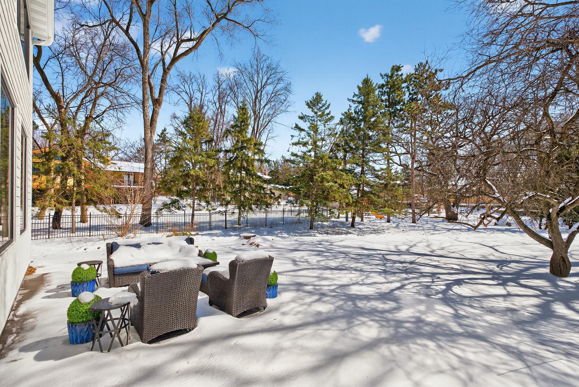 Beautiful, rare, flat half-acre lot with mature trees