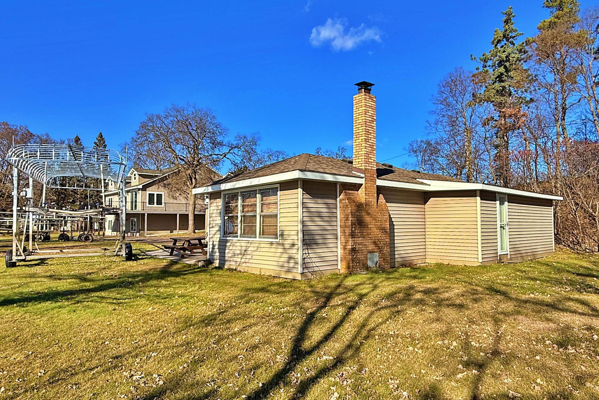 Main house lake side view with fireplace.jpg
