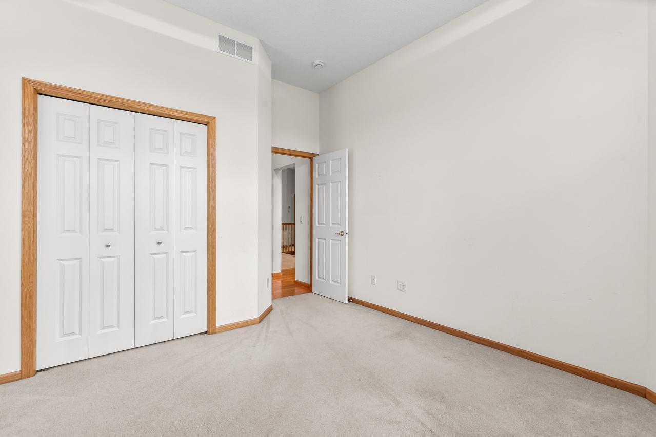 . An additional main-level bedroom, filled with natural light and thoughtfully set apart from the main living areas, offers flexibility as an office, playroom, reading nook, or guest space.