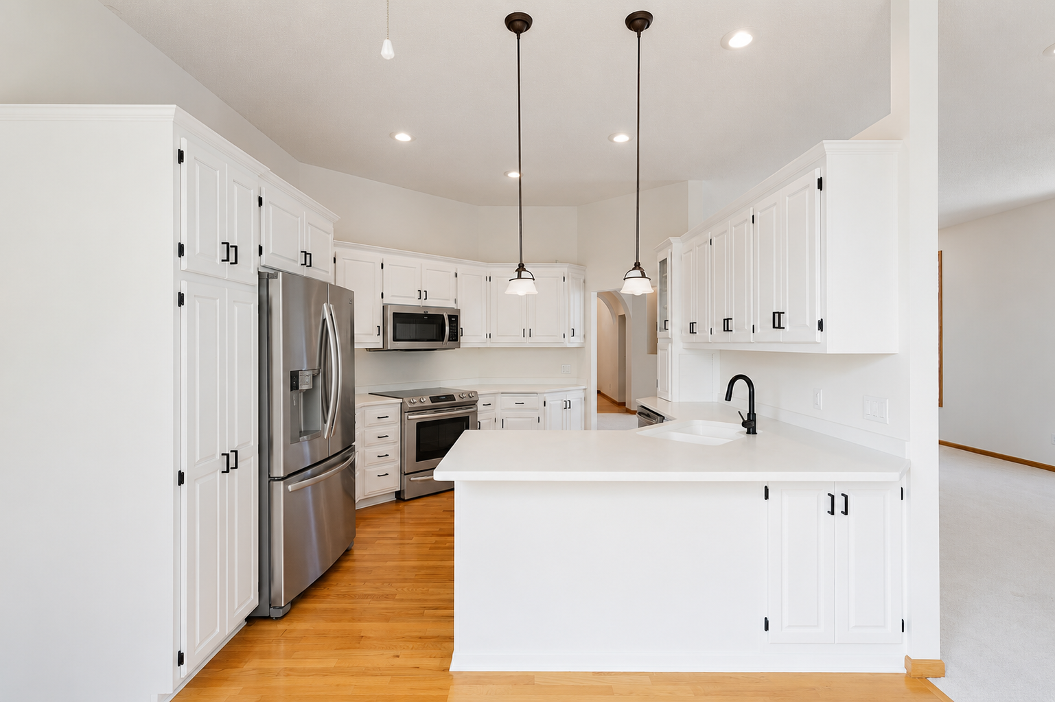 Beautifully updated kitchen! Fresh updated paint and stainless steel appliances will be installed soon. (AI image of appliance)