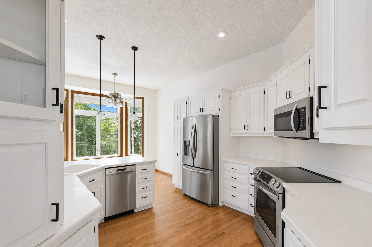 Beautifully updated kitchen! Fresh updated paint and stainless steel appliances will be installed soon. (AI image of appliance)