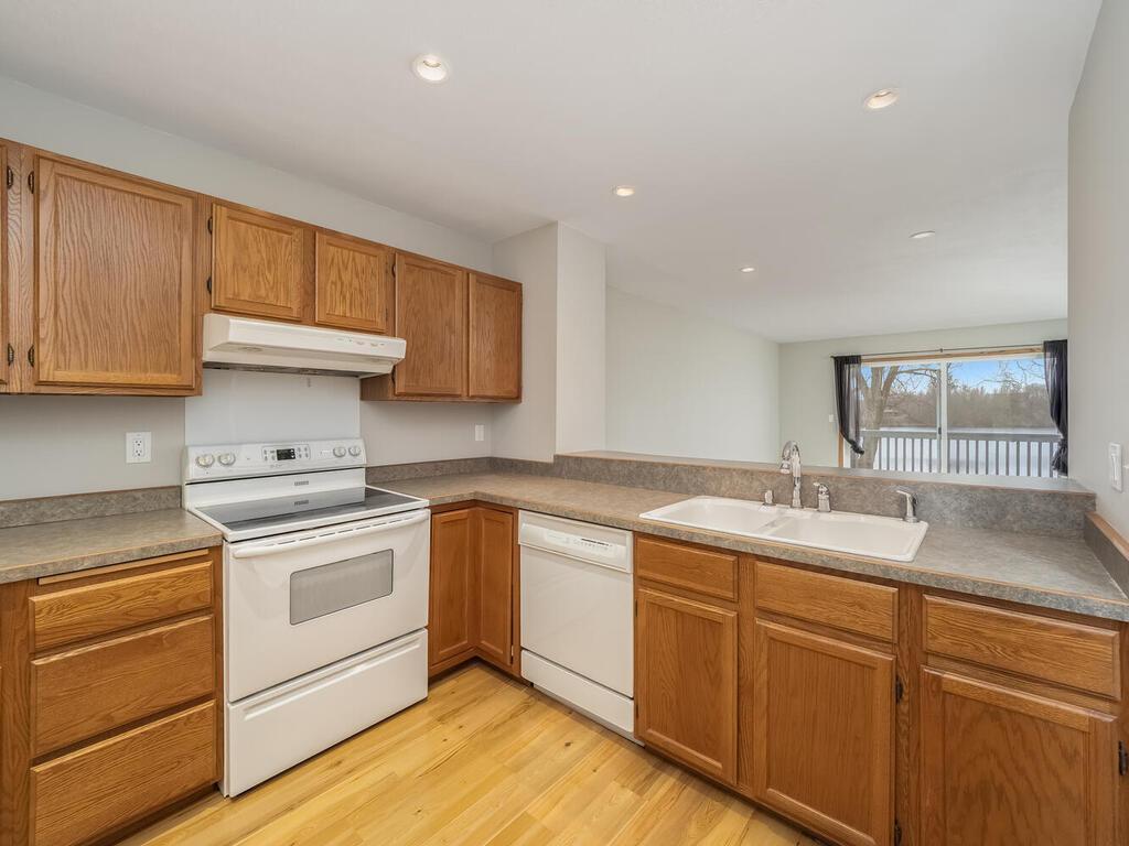 Spacious kitchen with Electric Stove, Recessed lighting and views of Lemay Lake