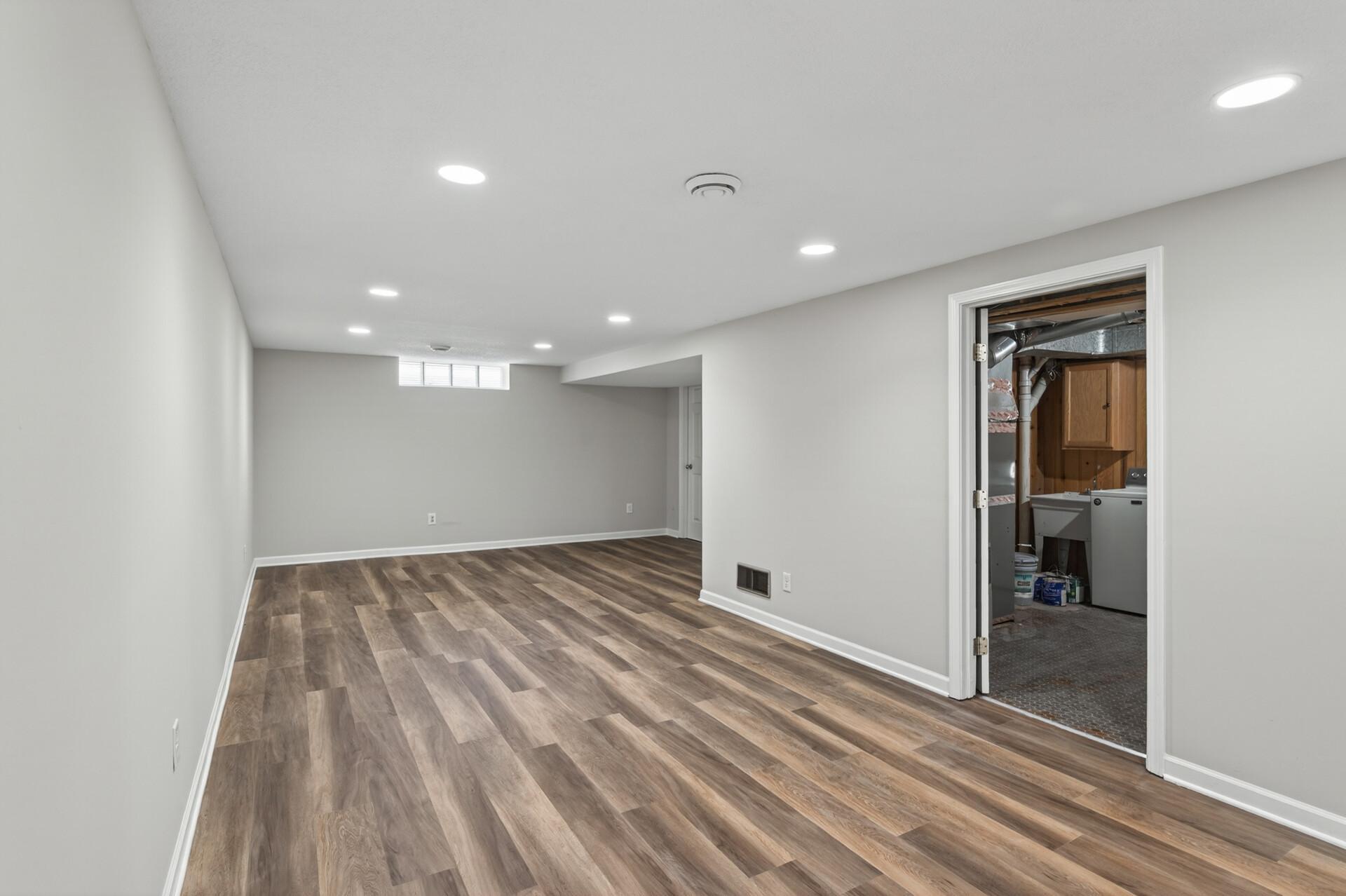 Downstairs, you’ll find a spacious recreation room.