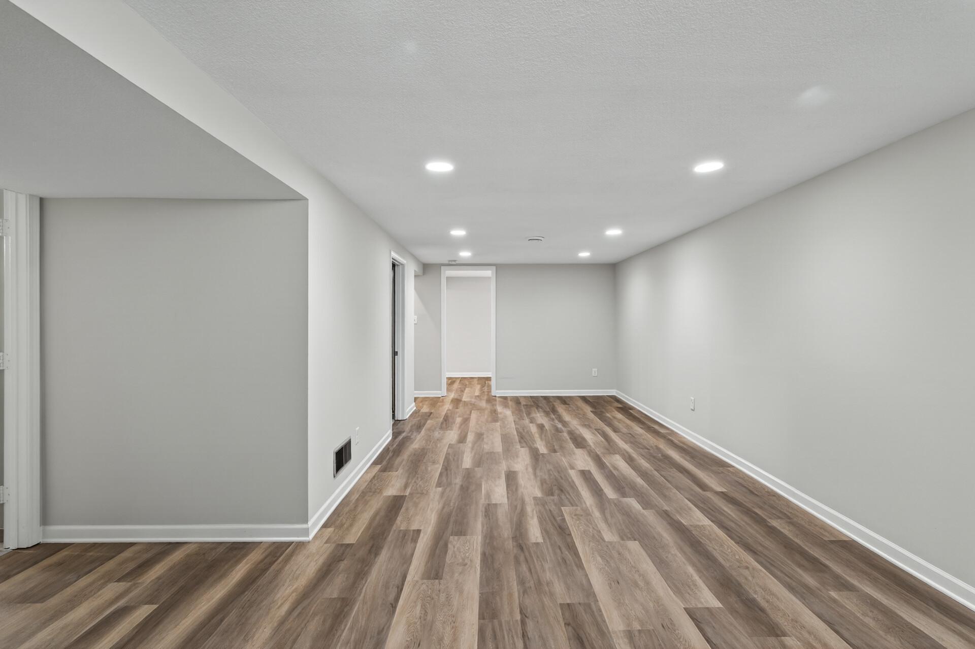 Recessed lighting and consistent flooring and paint throughout create a cohesive look, making this home truly move-in ready!