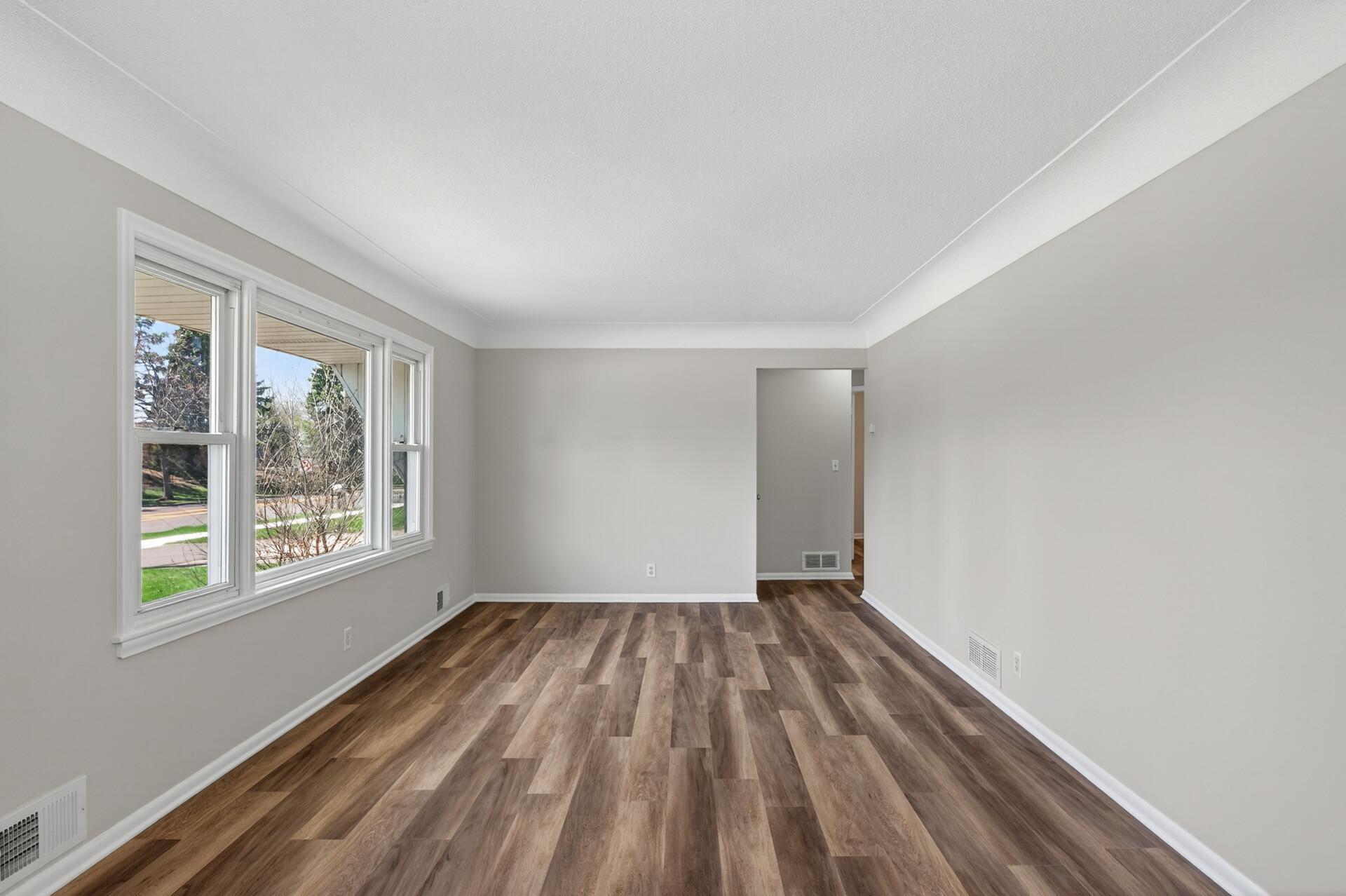 The main level offers a seamless flow from room to room, perfect for entertaining.