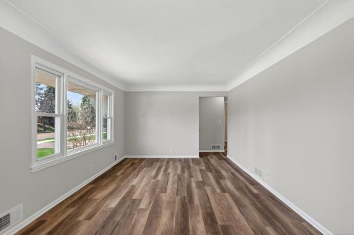 The main level offers a seamless flow from room to room, perfect for entertaining.