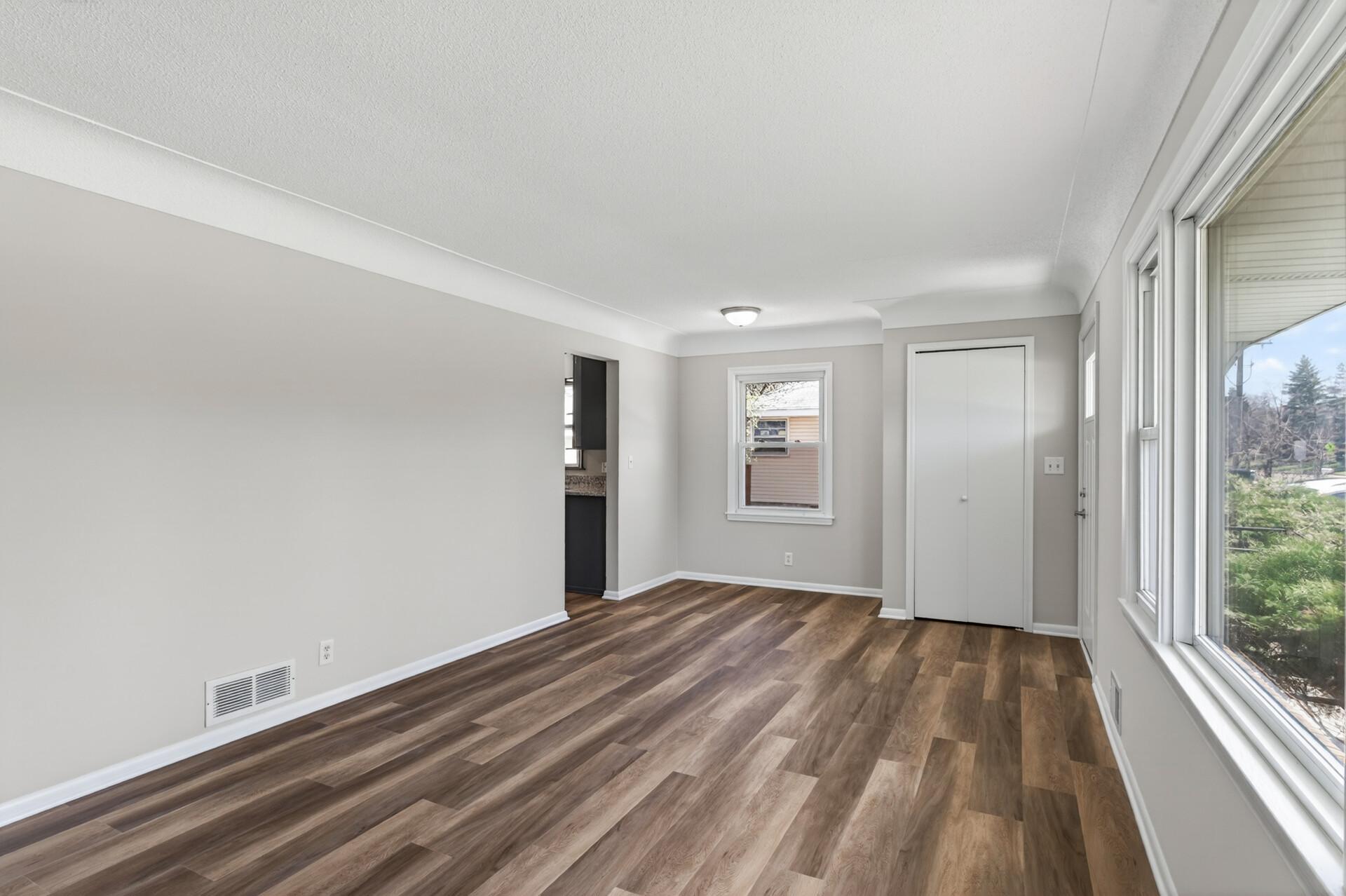 Convenient entryway closet for neatly tucking away coats and shoes.