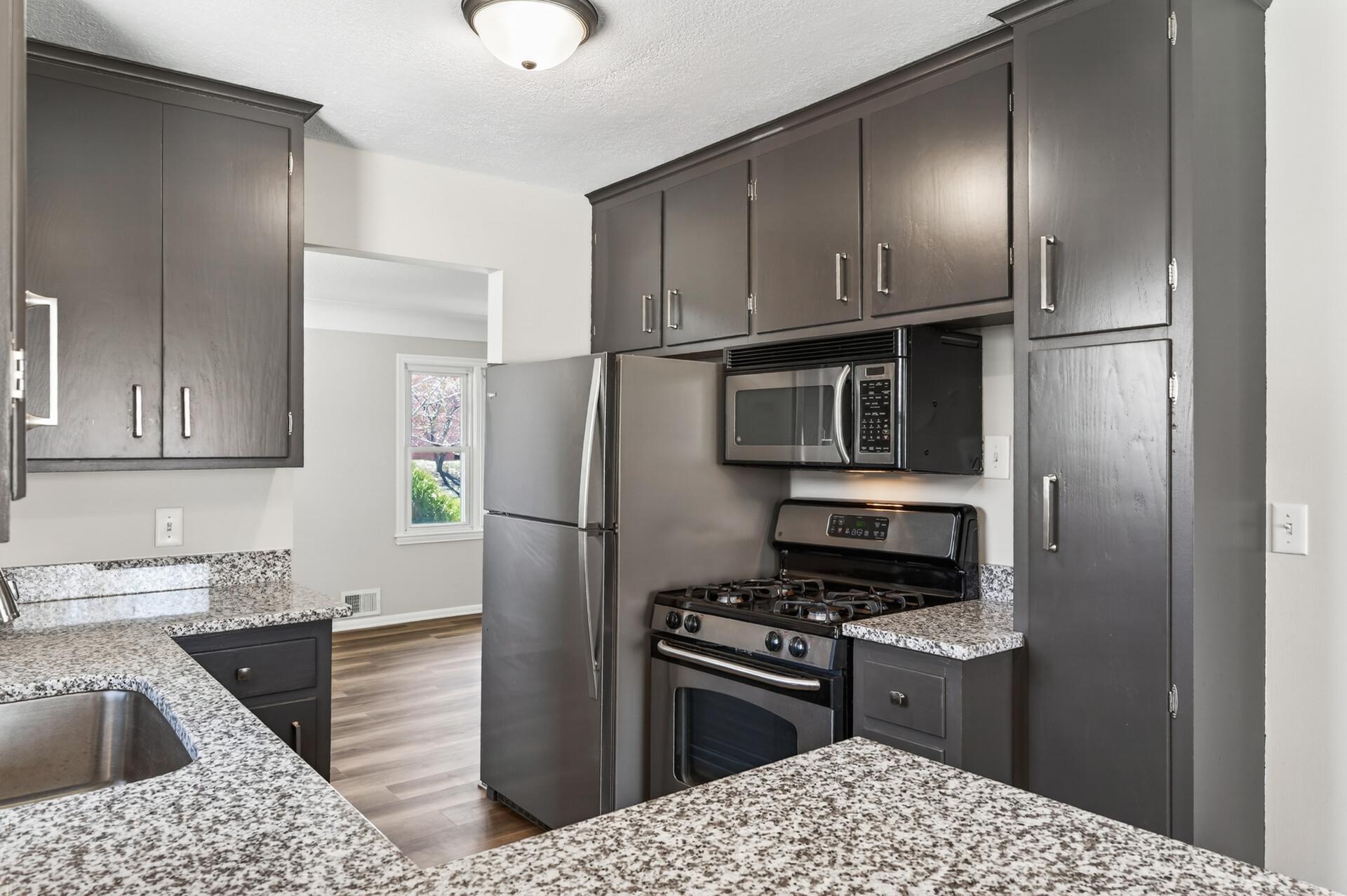 Stainless steel appliances create a clean, cohesive look that is easy to maintain.