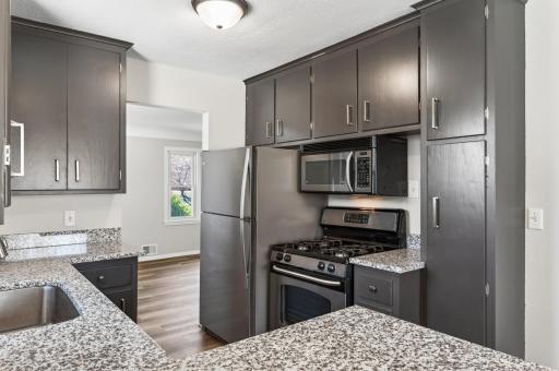 Stainless steel appliances create a clean, cohesive look that is easy to maintain.