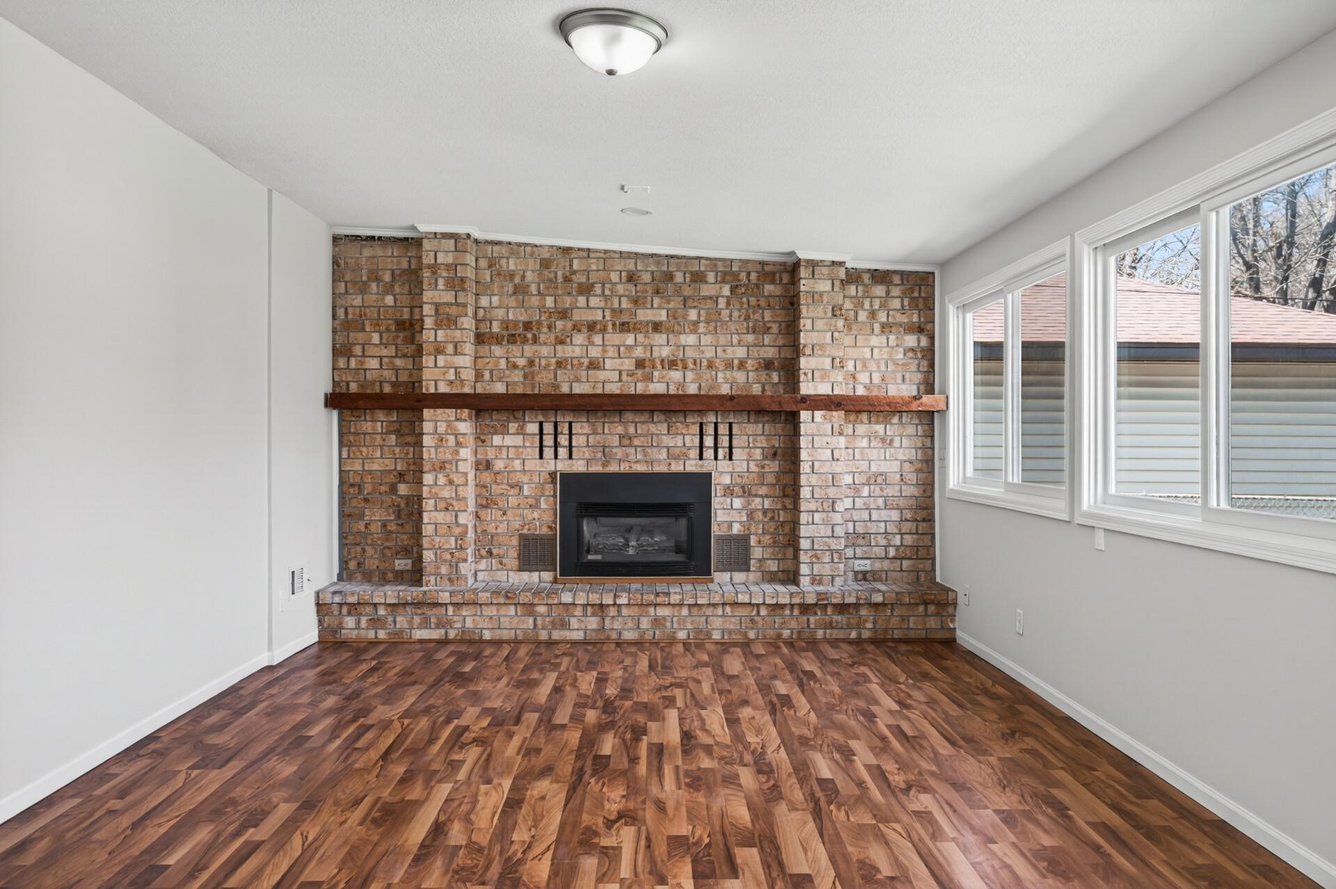 Complete with a cozy brick fireplace.