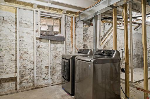 Laundry space in the basement.
