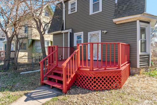 Step outside and enjoy your backyard. A newly painted back deck offers a fresh, inviting space for morning coffee or evening gatherings.