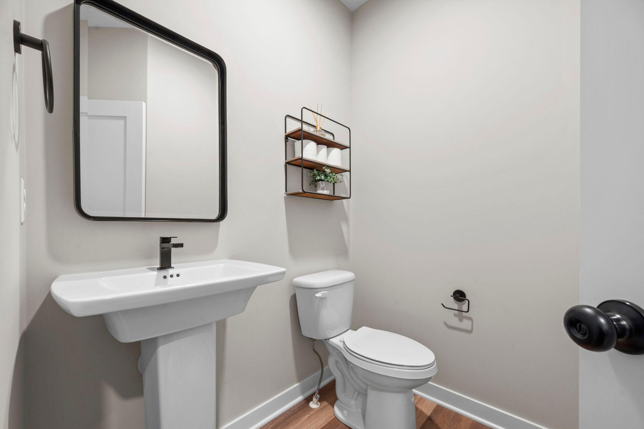 Main level half bath.