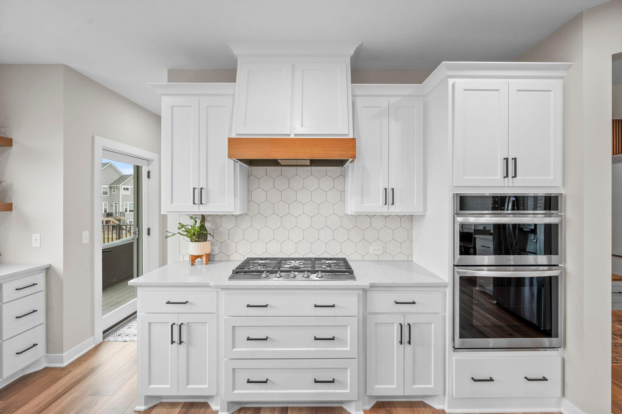 Cooktop and hood make this a chef's dream!