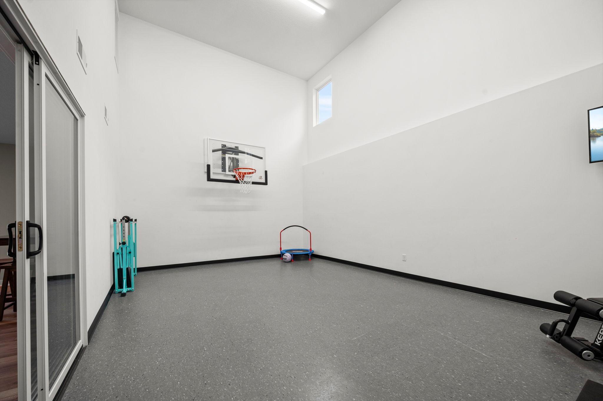 Lower level sport court for your enjoyment and workout space!