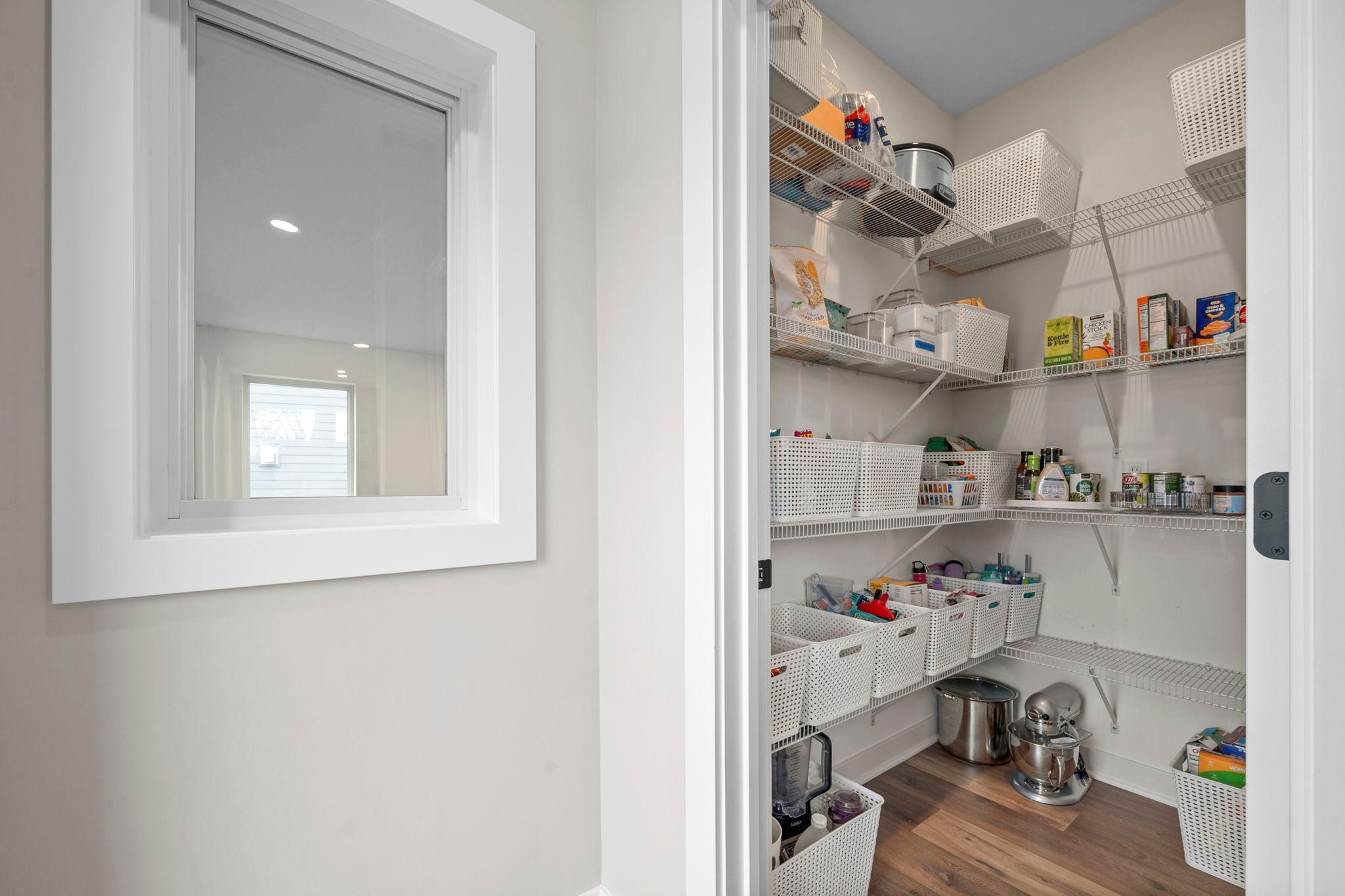 Window has views to the Sport Court from the kitchen area