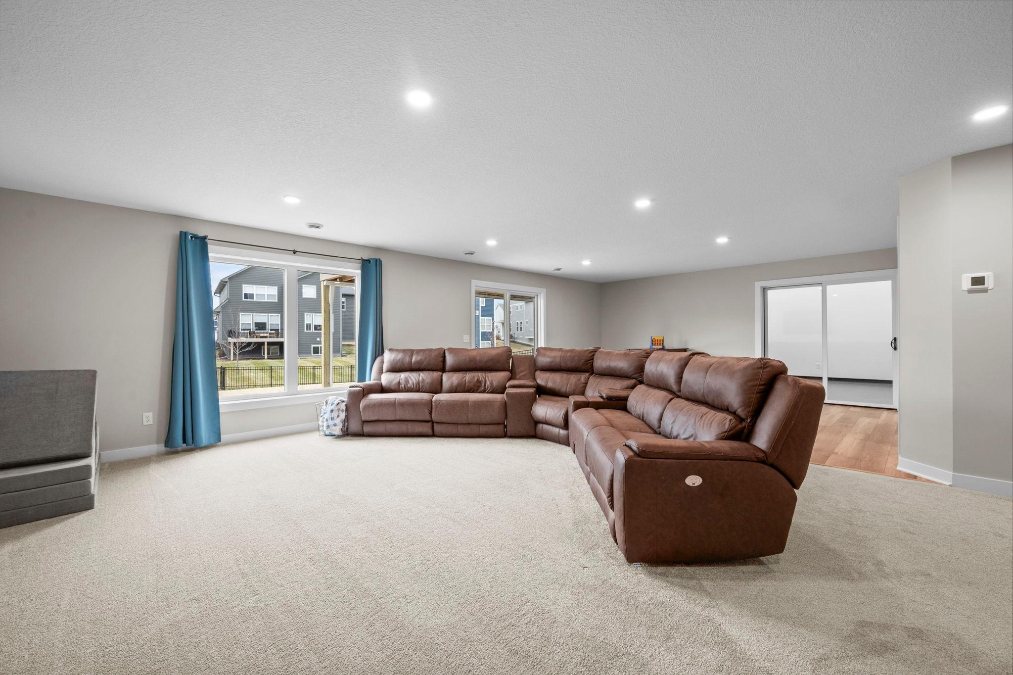 Spacious lower level walkout family room.