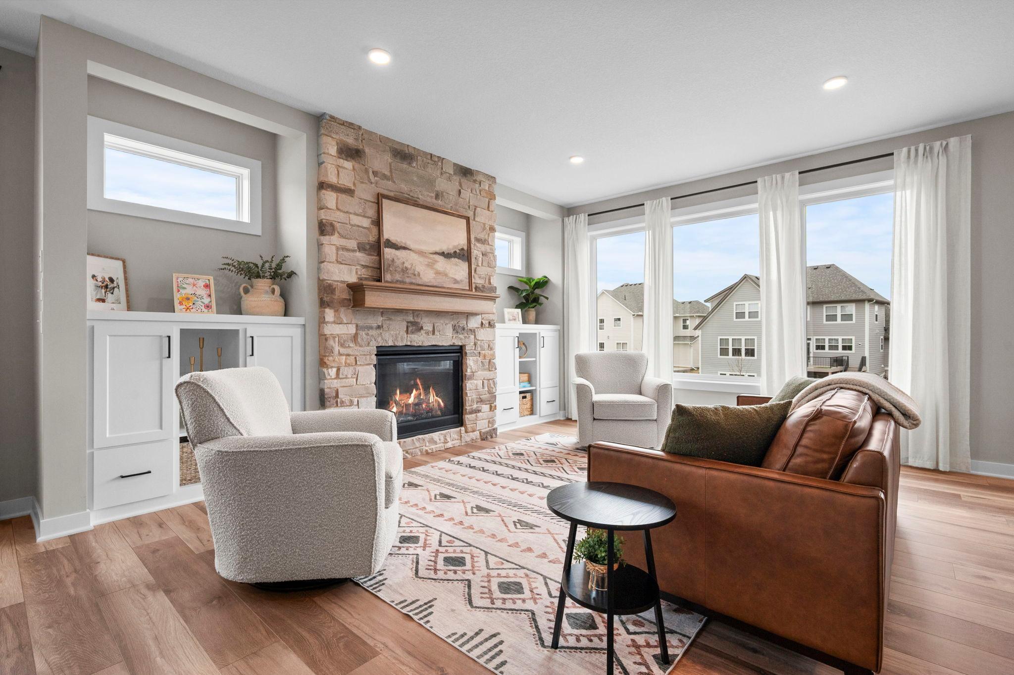 Stunning gas fireplace is the focal point of your living room.