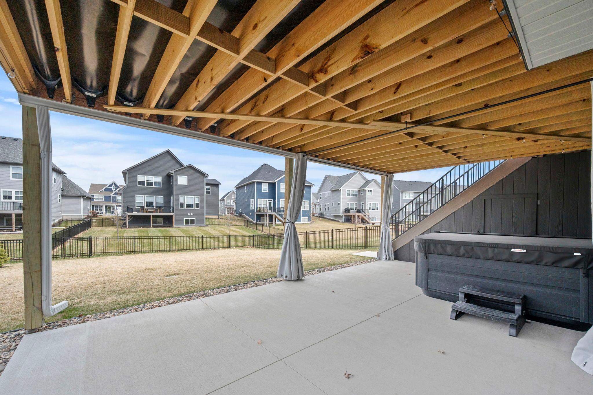 Rain Escapes under the deck keep the patio dry.