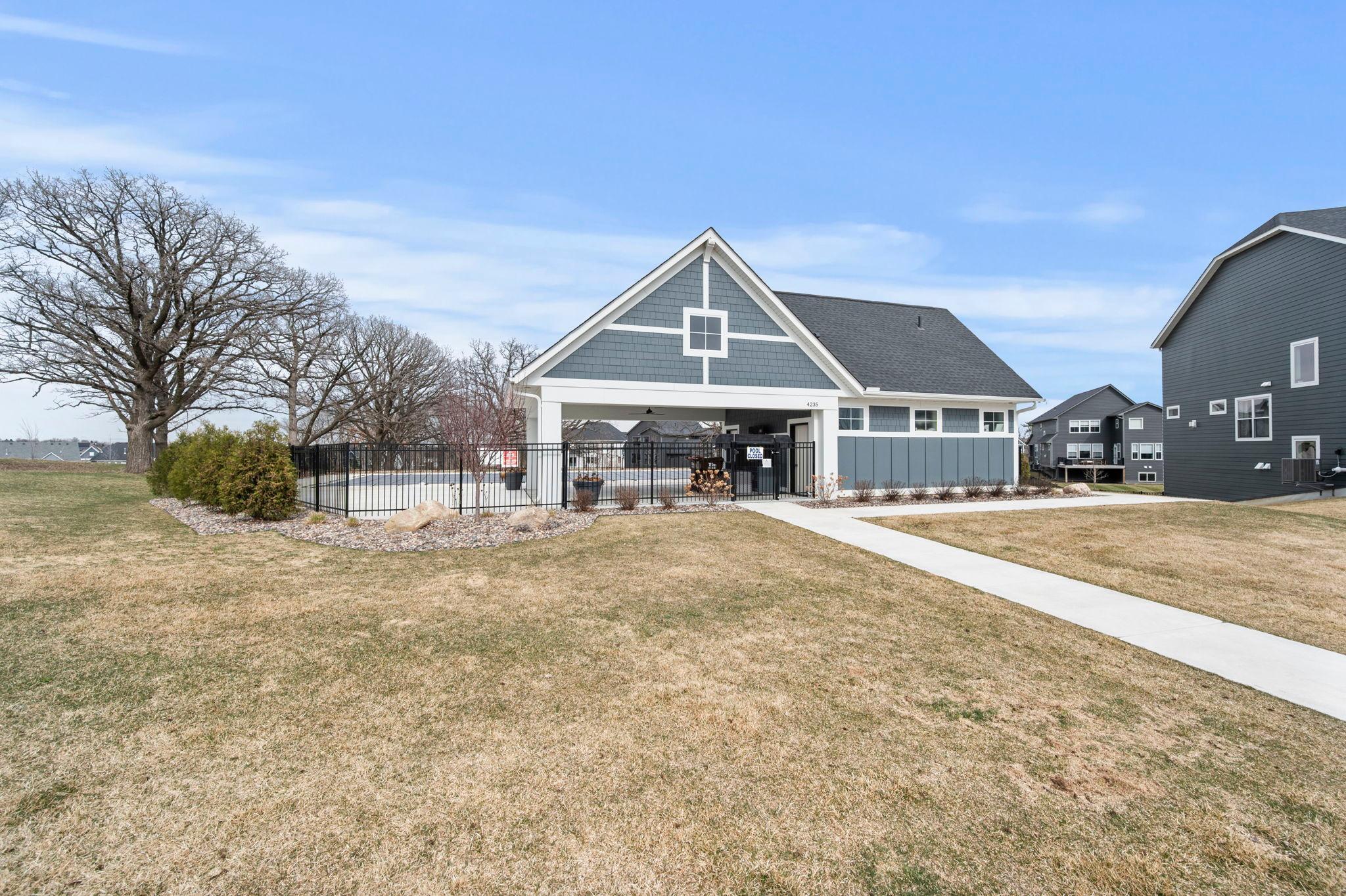 Covered area, chairs, grill, fridge, bathrooms and showers for pool use.