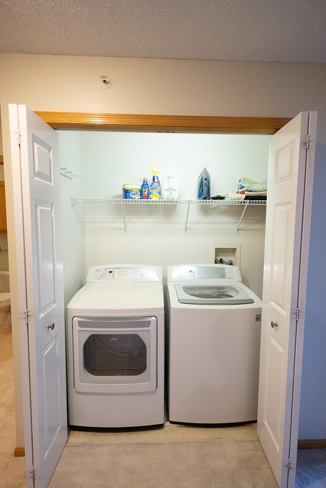 Laundry closet, upper level.