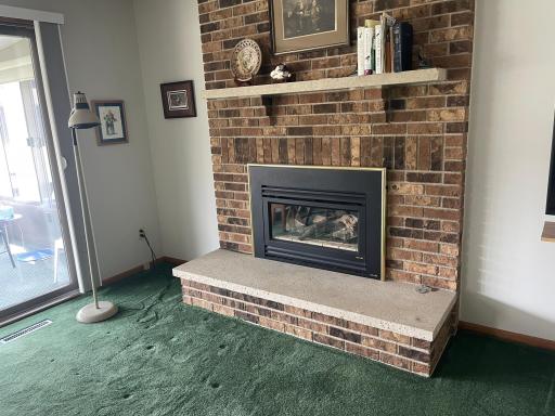 GAS FIREPLACE IN OPEN CONCPET LIVING ROOM