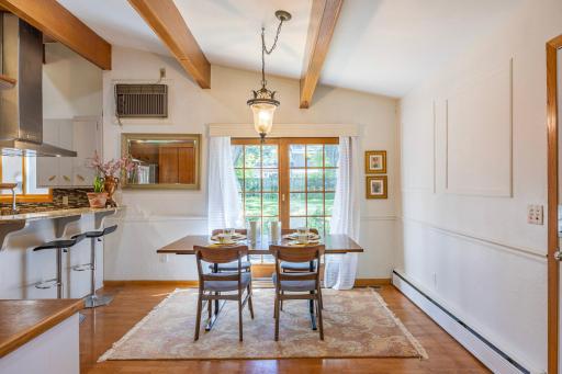 Enjoy your meals while watching birds and a soon to bloom beautiful perennial garden outside.