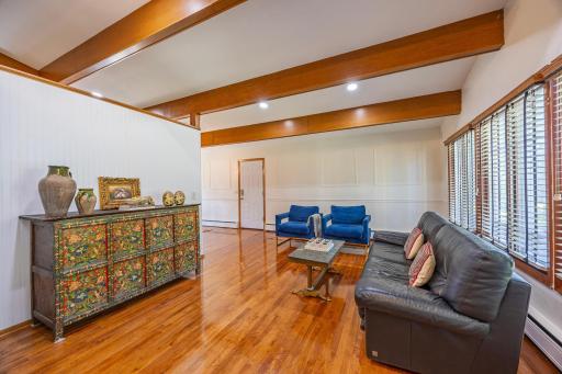 Notice the warmth of gleaming hardwood floors
