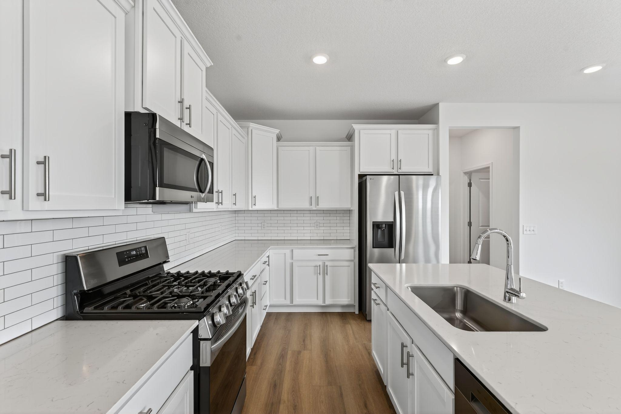 (Photo of a similar home, actual finishes may vary)