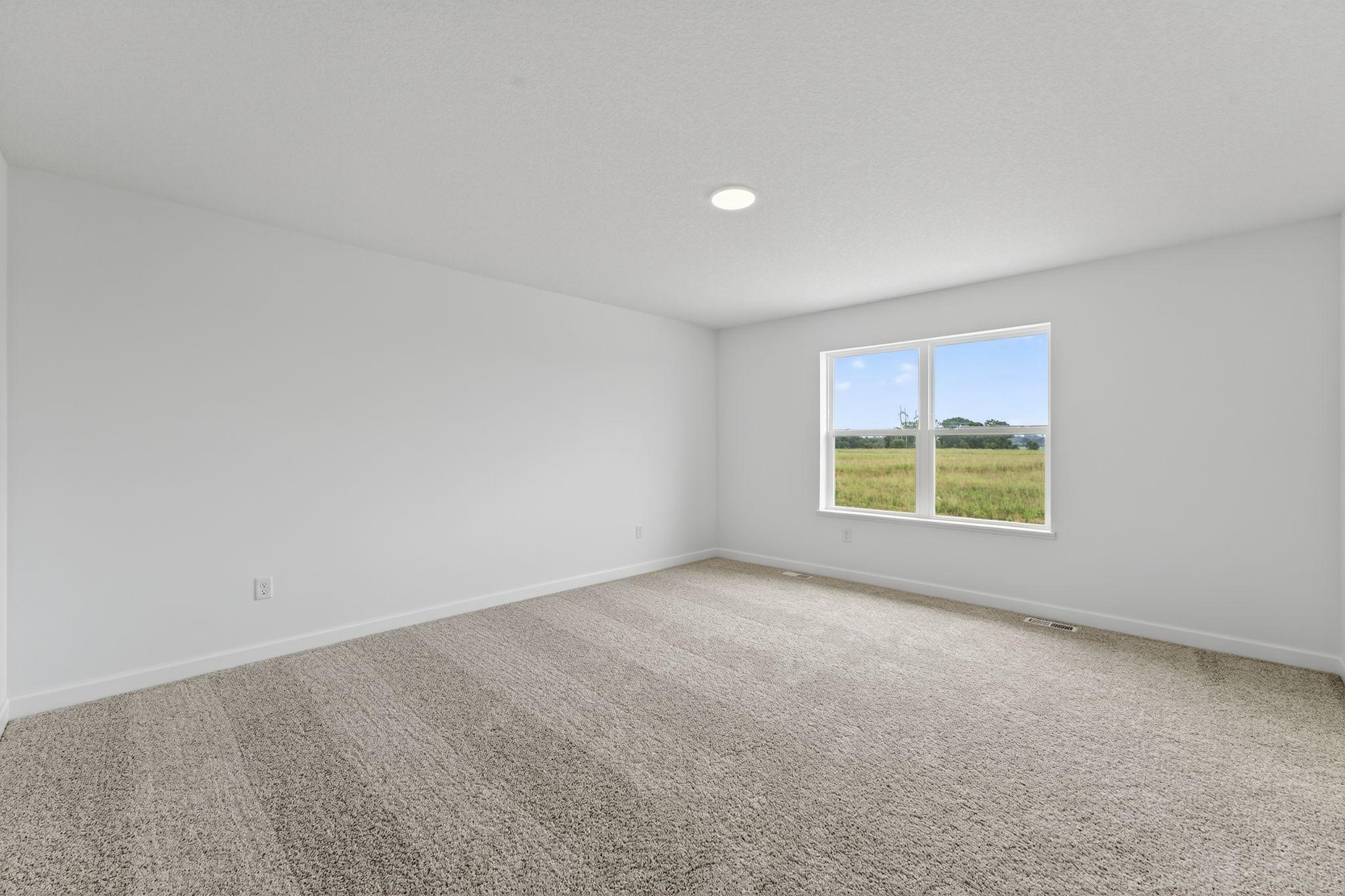 (Photo of a similar home, actual finishes may vary)